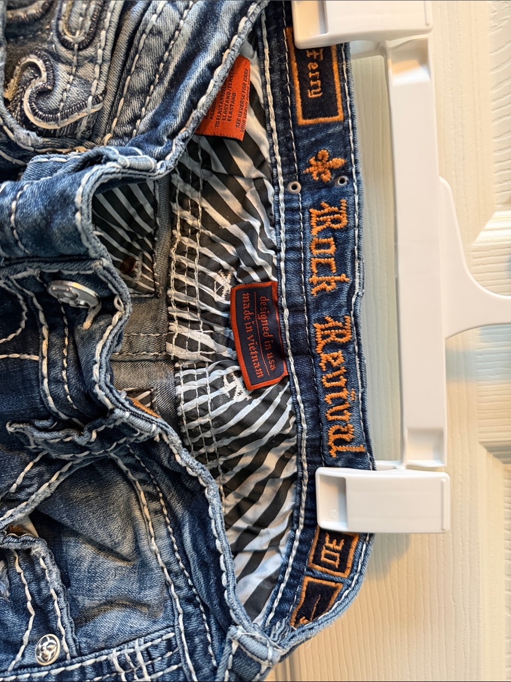 Rock Revival Men’s Blue Denim Jeans with Orange Embroidery